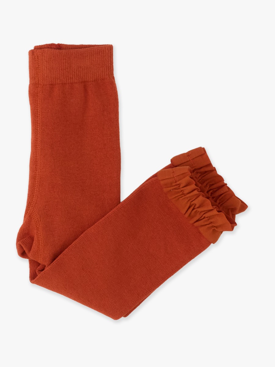 Line drawing of Rust Footless Ruffle Tights. A dotted circle indicates the approximate location for personalization.