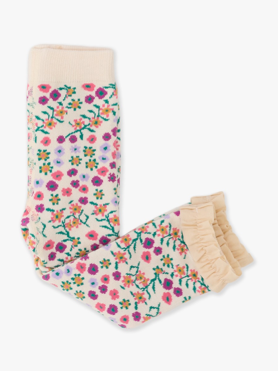 Line drawing of Wildflower Meadow Patterned Footless Ruffle Tights. A dotted circle indicates the approximate location for personalization.