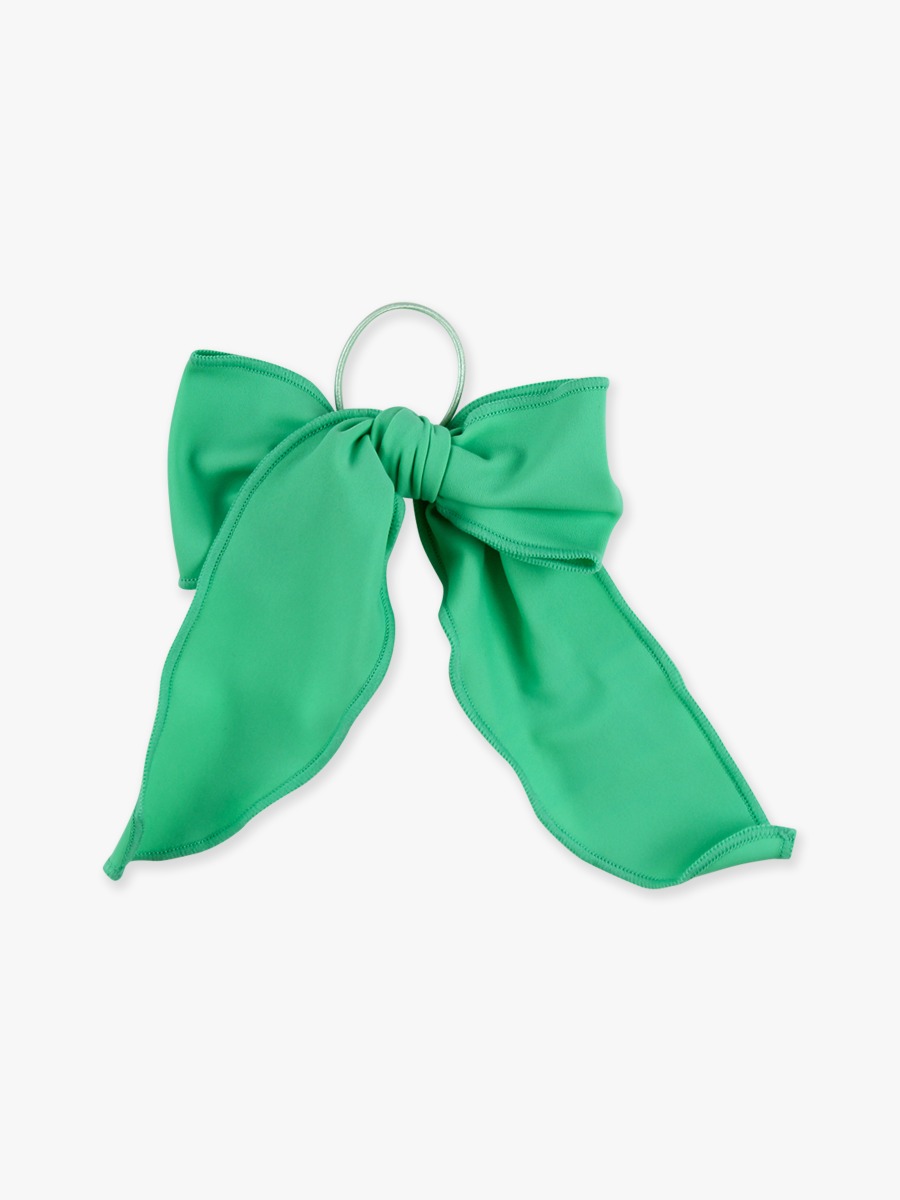 Line drawing of Spring Green Active Bow. A dotted circle indicates the approximate location for personalization.