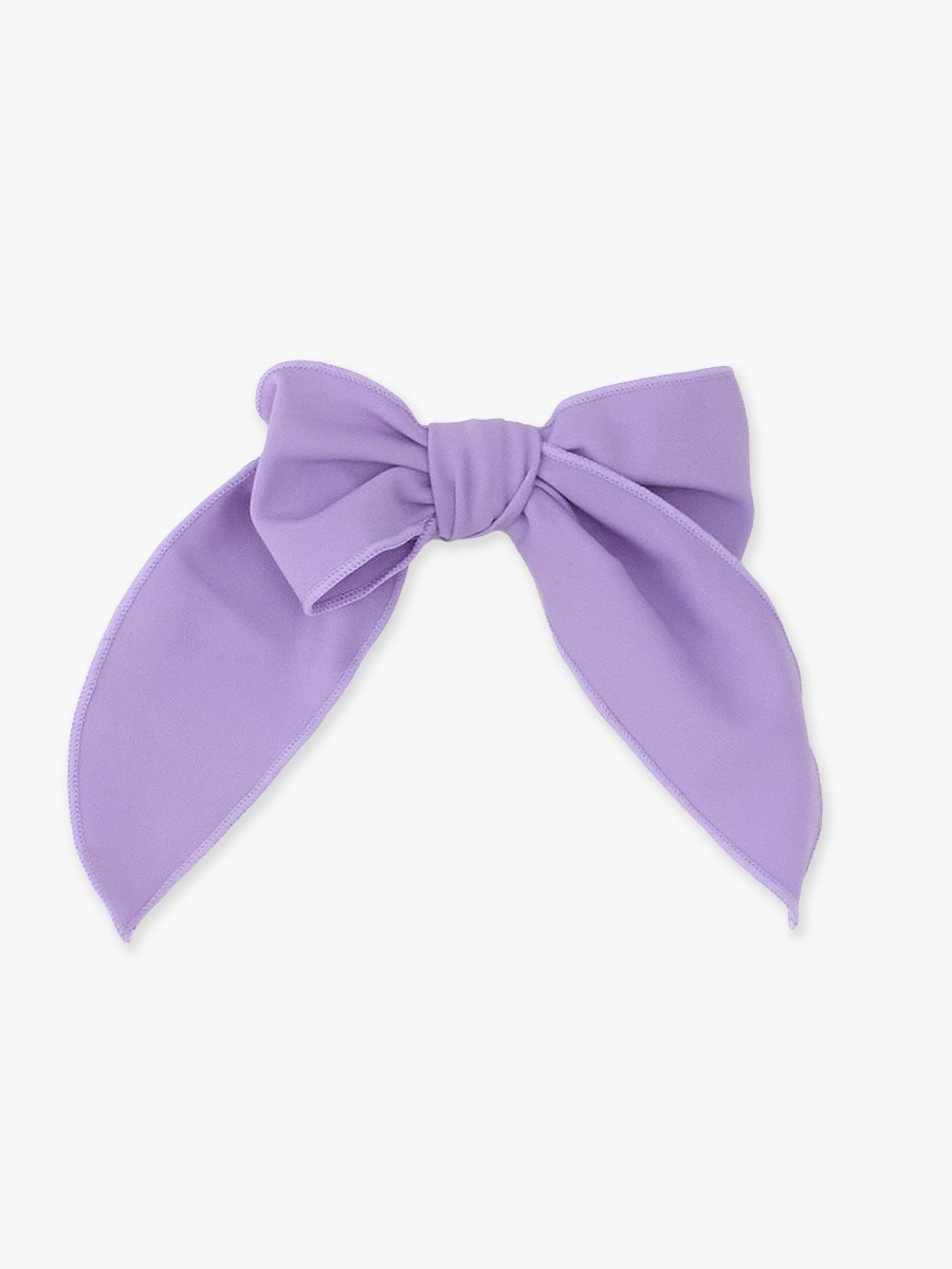 Line drawing of Wisteria Purple Active Bow Clip. A dotted circle indicates the approximate location for personalization.