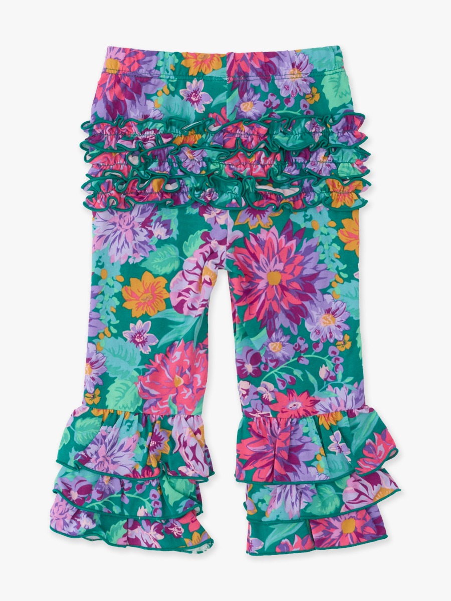 Line drawing of Wisteria Blooms Flare Pants, with Signature Rear Ruffles. A dotted circle indicates the approximate location for personalization.