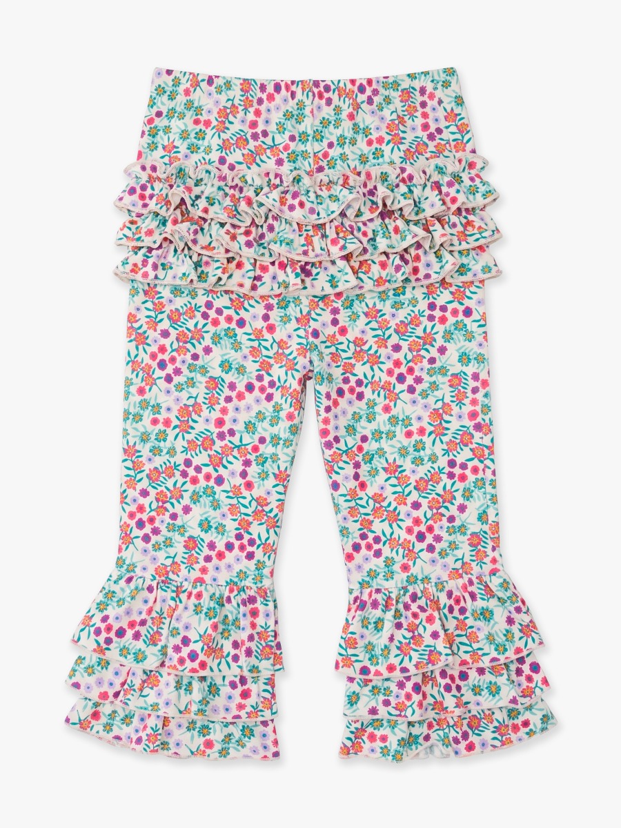 Line drawing of Wildflower Meadow Flare Pants, with Signature Rear Ruffles. A dotted circle indicates the approximate location for personalization.