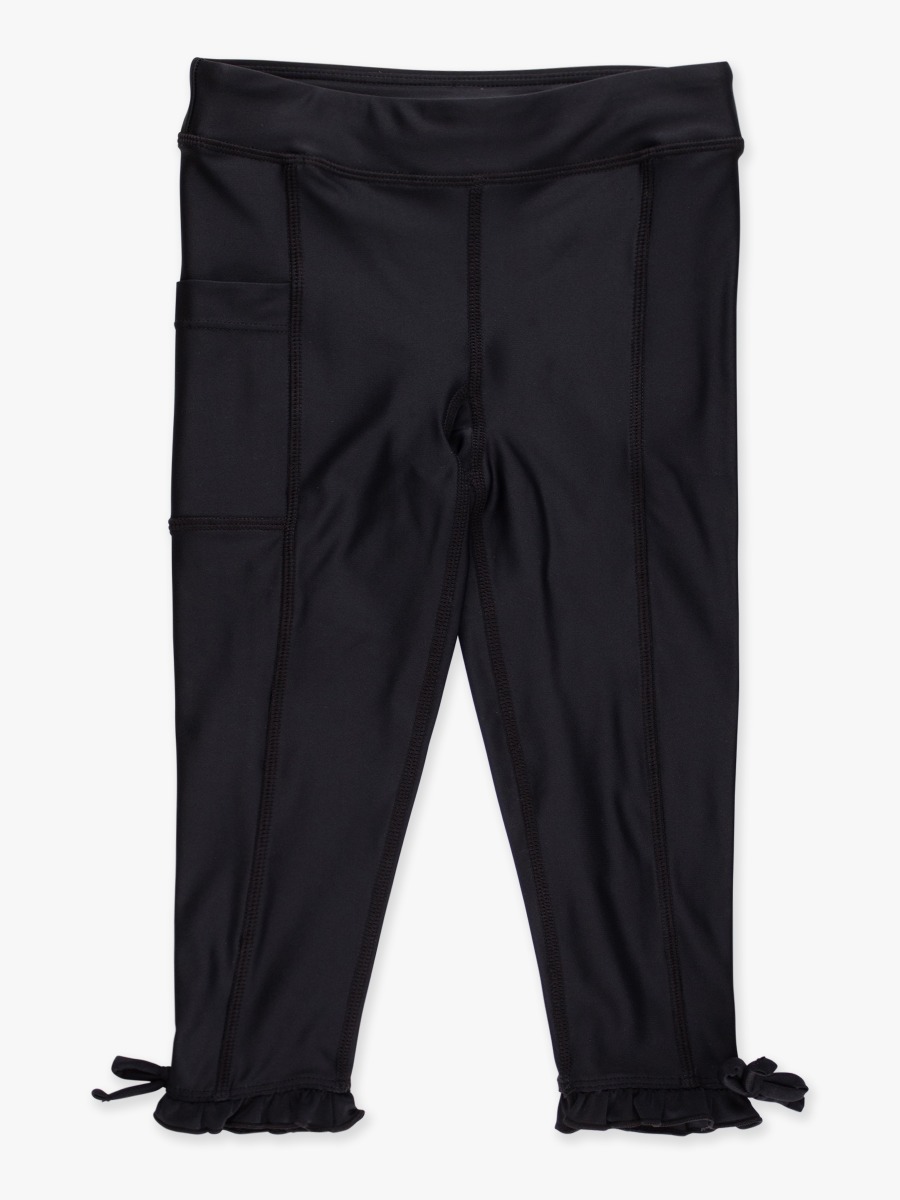 Line drawing of Black Active Pocket Ruffle Legging. A dotted circle indicates the approximate location for personalization.