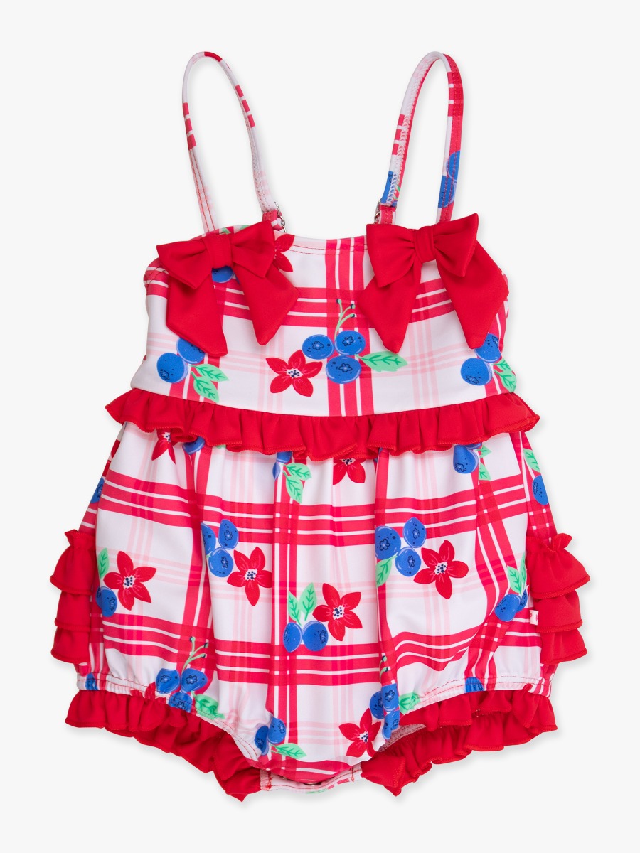 Line drawing of Red, White, & Blueberry One Piece Bow Bubble Romper Swimsuit, with Signature Rear Ruffles. A dotted circle indicates the approximate location for personalization.