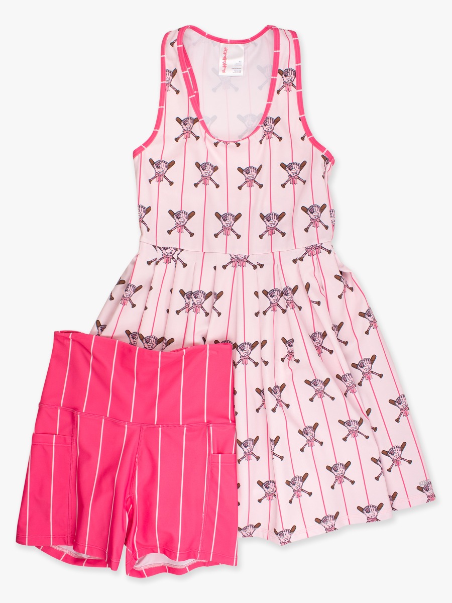 Line drawing of Pink Batter Up Women's Active Dress & Bike Short Set. A dotted circle indicates the approximate location for personalization.