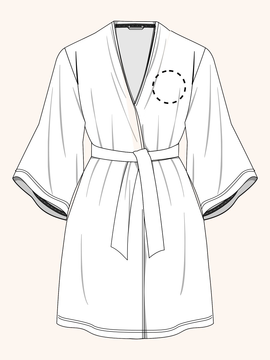 Line drawing of a swimsuit. A dotted circle is placed on the front center of the swimsuit's chest area, indicating the approximate location for personalization.