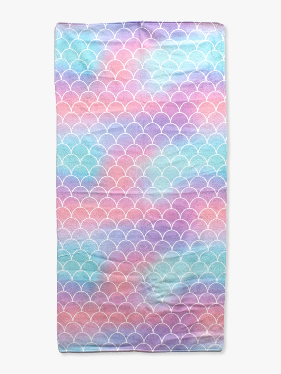 Line drawing of Mermaid Tale Printed Beach Towel. A dotted circle indicates the approximate location for personalization.