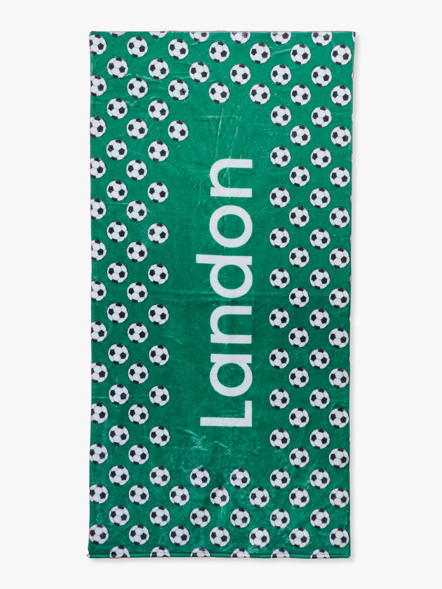 Line drawing of Soccer Mania Personalized Beach Towel. A dotted circle indicates the approximate location for personalization.