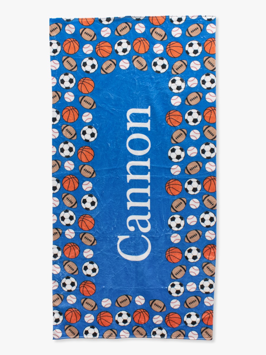 Line drawing of All-Star Action Personalized Beach Towel. A dotted circle indicates the approximate location for personalization.