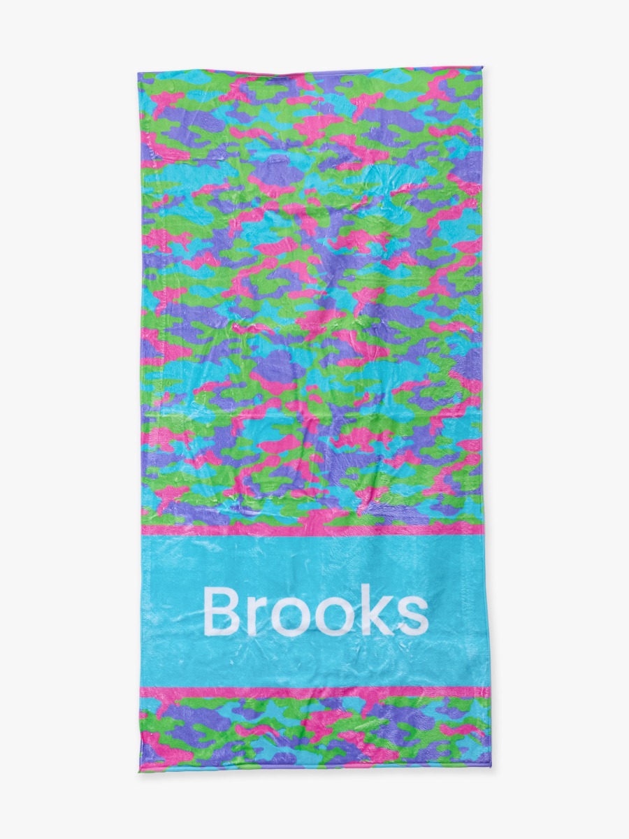 Line drawing of Neon Camo Personalized Beach Towel. A dotted circle indicates the approximate location for personalization.