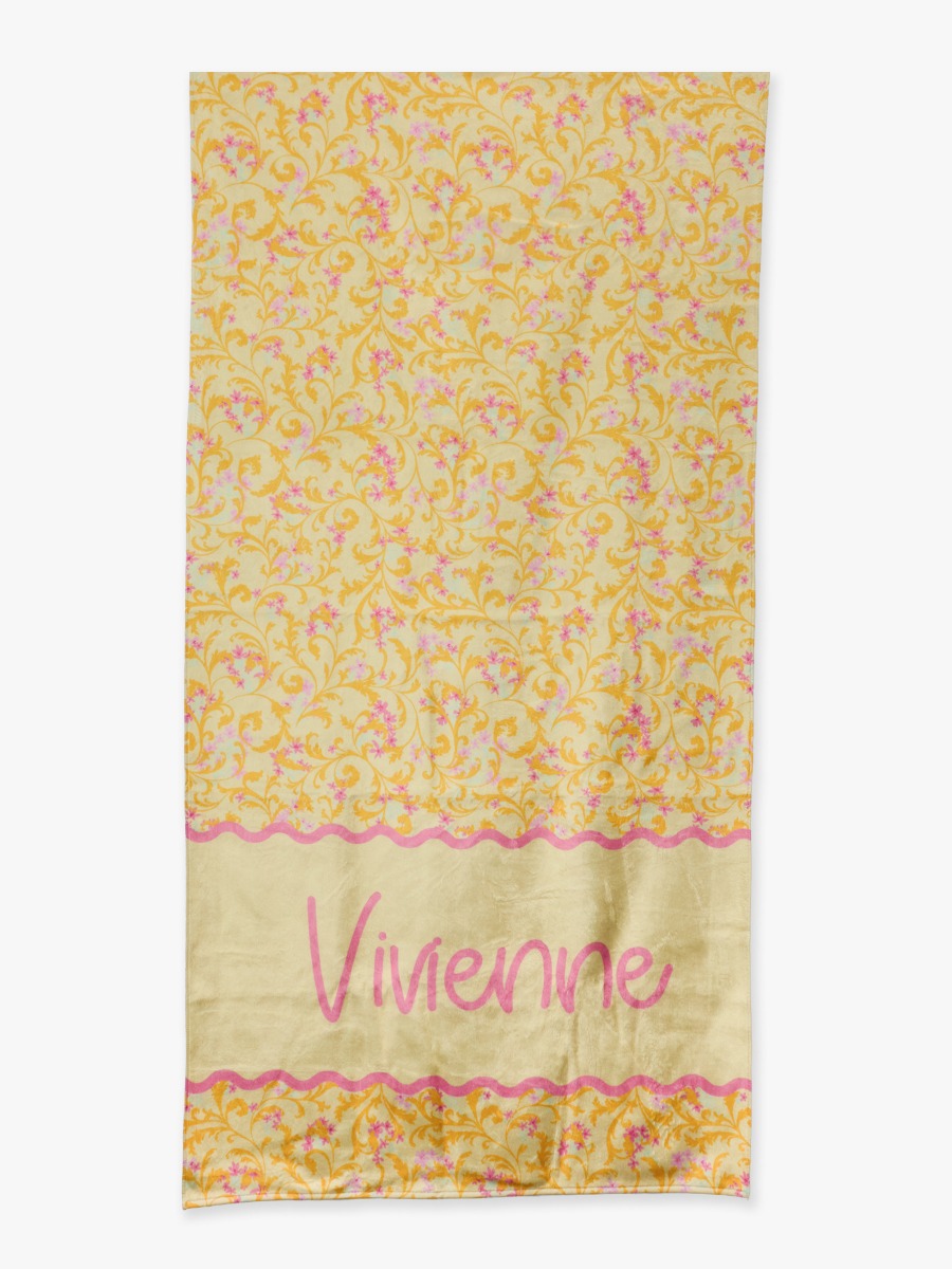 Line drawing of Banana Enchanted Flowers Personalized Beach Towel. A dotted circle indicates the approximate location for personalization.