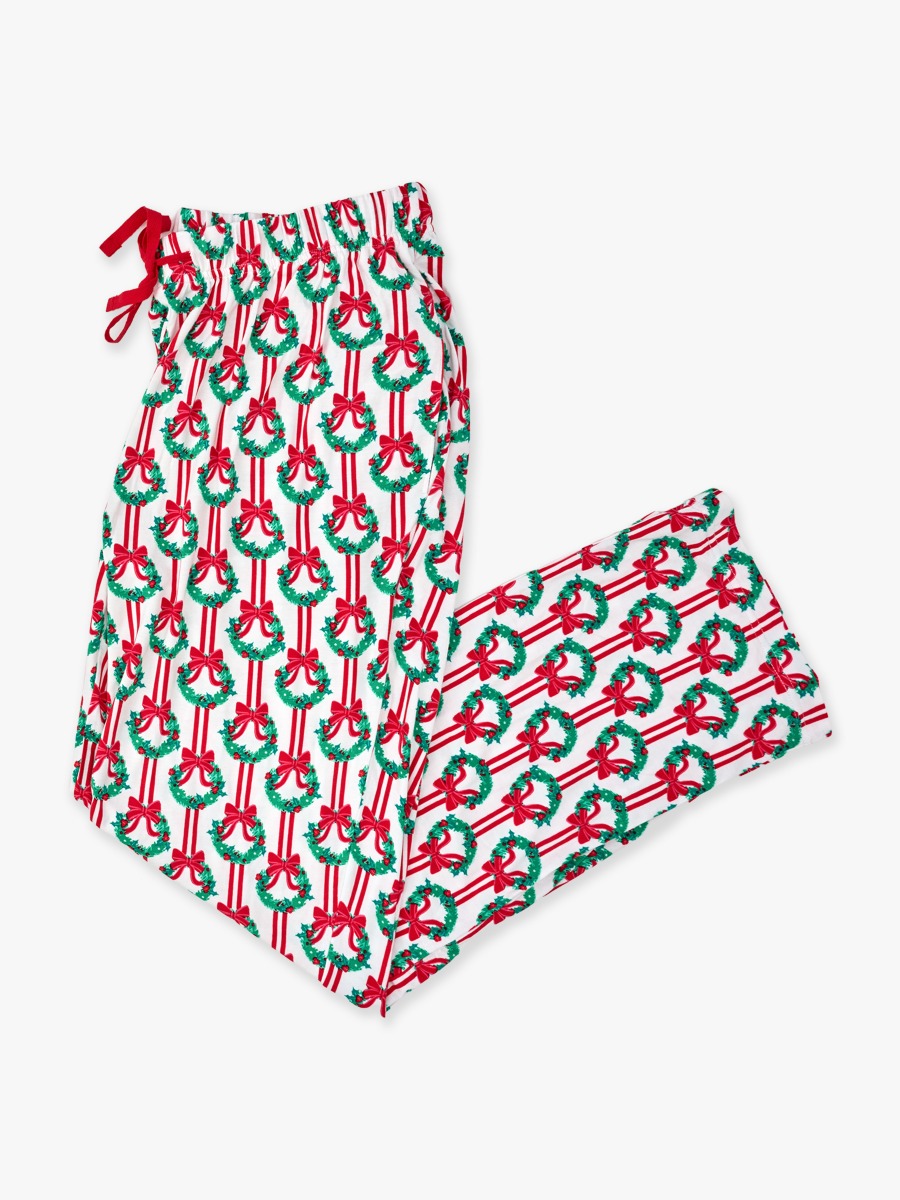 Line drawing of Deck The Halls Adult Pajama Pants, Bamboo Viscose. A dotted circle indicates the approximate location for personalization.