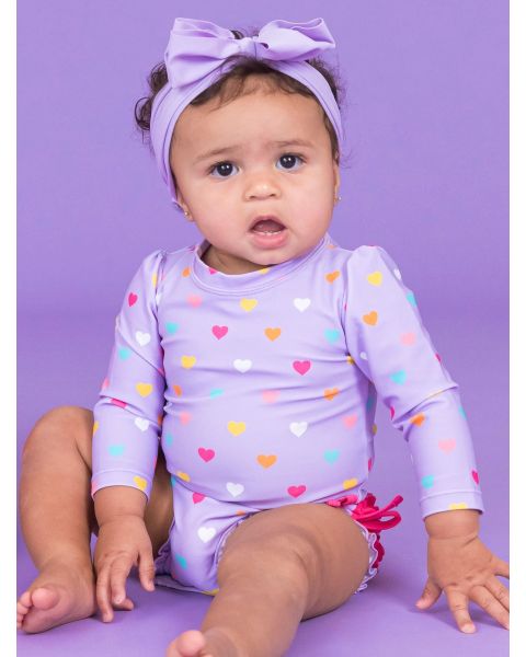 Lavender Colorful Hearts Long Sleeve One Piece Rash Guard Swimsuit, with Signature Rear Ruffles
