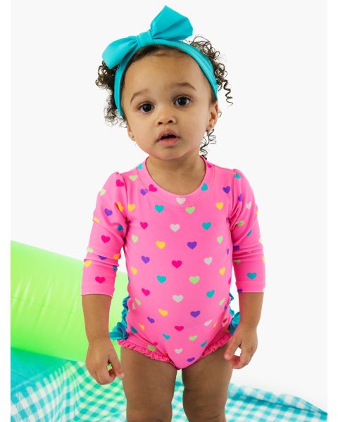 Neon Pink Colorful Hearts Long Sleeve One Piece Rash Guard Swimsuit, with Signature Rear Ruffles