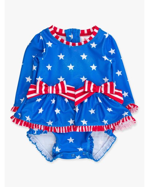 Shimmer Stars & Stripes Long Sleeve One Piece Bow Peplum Rash Guard Swimsuit, with Signature Rear Ruffles