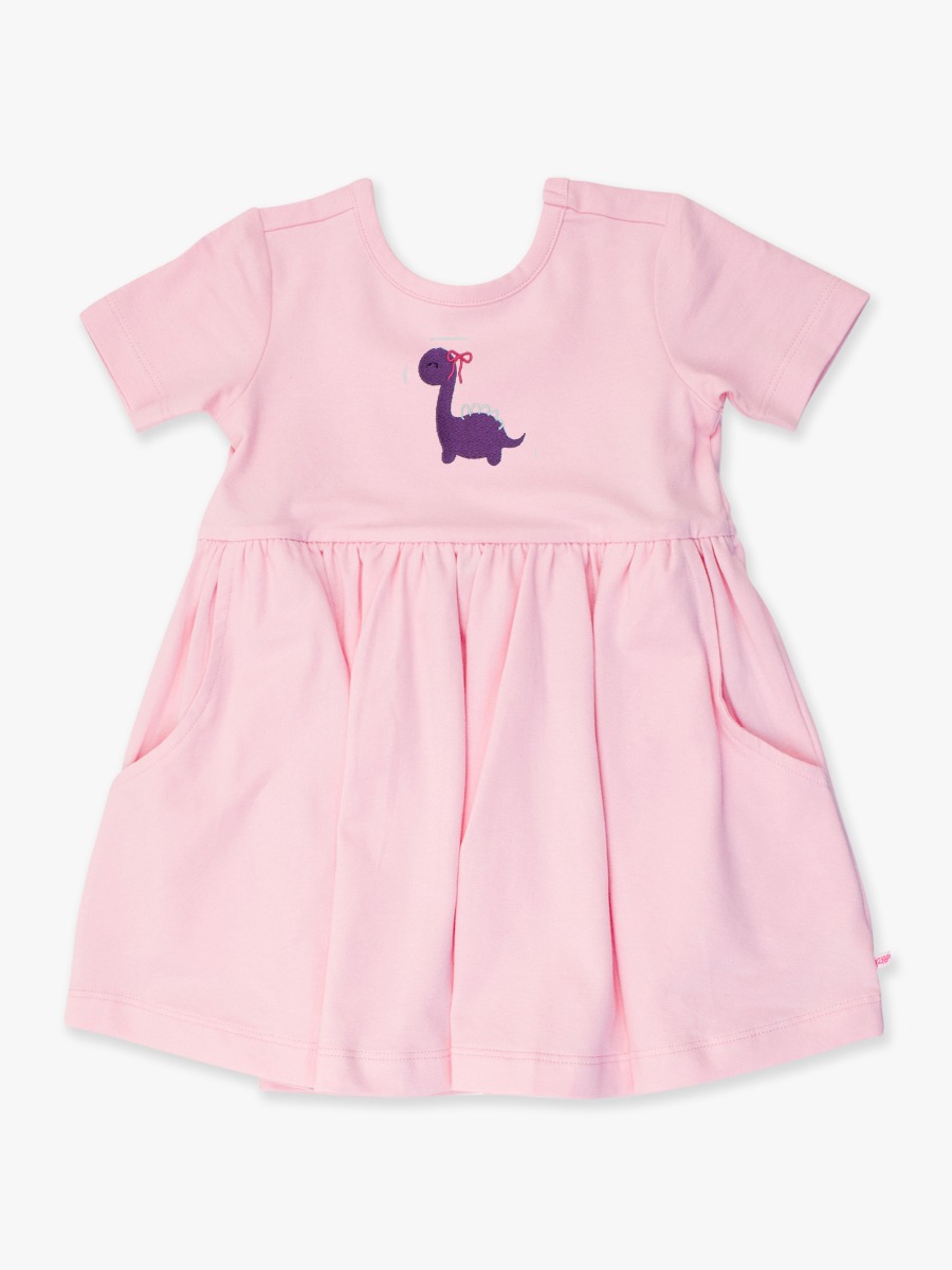 Line drawing of Purple Dino Embroidered Pink Knit Short Sleeve Twirl Dress. A dotted circle indicates the approximate location for personalization.