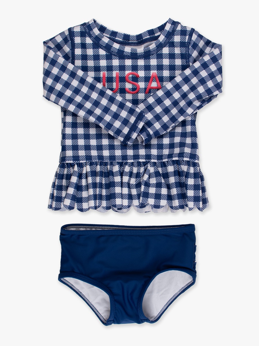 Line drawing of Red USA Embroidered Navy & White Gingham Scallop Hem Long Sleeve Rash Guard 2-Piece, with Signature Rear Ruffles. A dotted circle indicates the approximate location for personalization.
