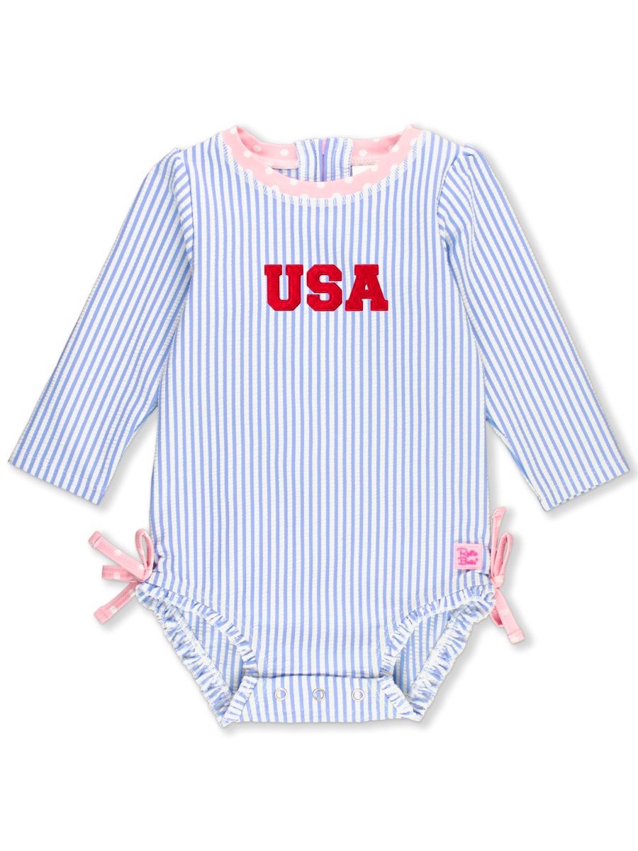 Line drawing of Red USA Embroidered Periwinkle Blue Seersucker Long Sleeve One Piece Rash Guard Swimsuit, with Signature Rear Ruffles. A dotted circle indicates the approximate location for personalization.