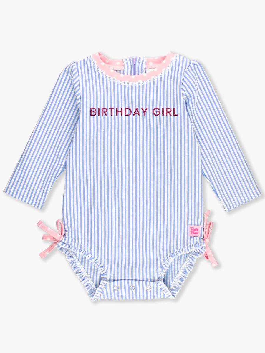 Line drawing of a swimsuit. A dotted circle is placed on the front center of the swimsuit's chest area, indicating the approximate location for personalization.
