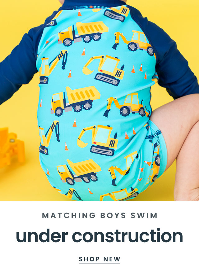 Matching Boys Swim Under Construction