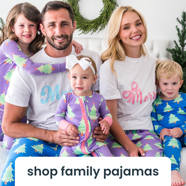Family wearing matching holiday pajamas with Christmas tree patterns. Text reads 'shop family pajamas.' Links to family pajama collection.