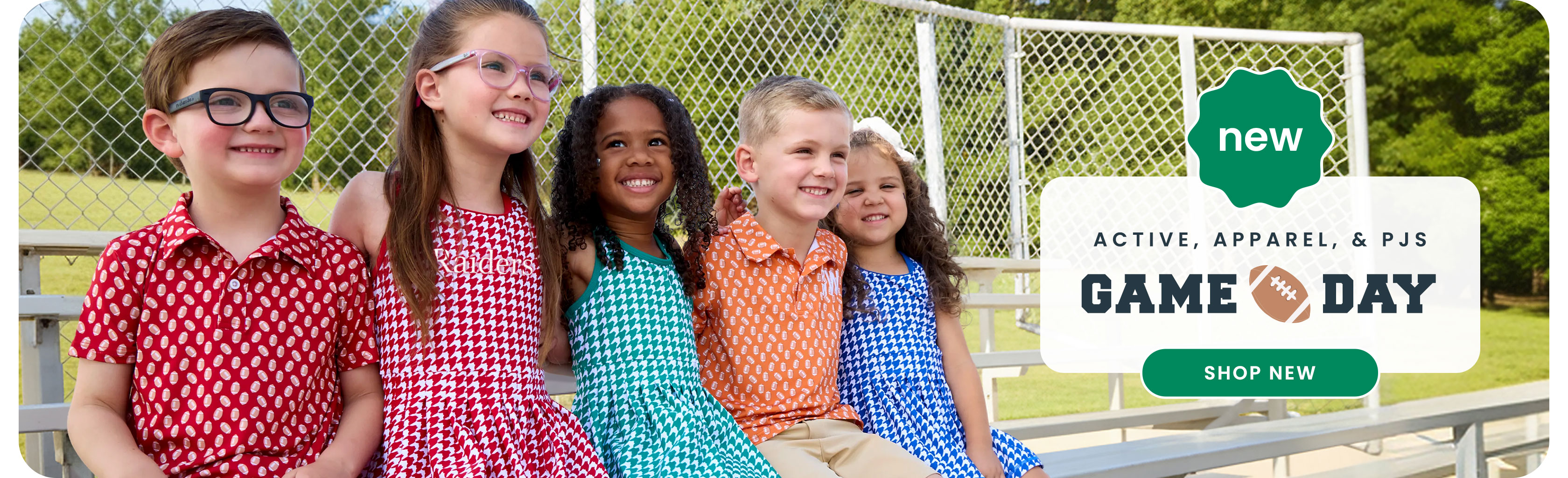"Banner reading ‘New Active, Apparel, & PJs — Game Day’ with football-themed graphics. Three children wearing coordinated game day outfits sit on bleachers. Includes a green ‘Shop New’ button."