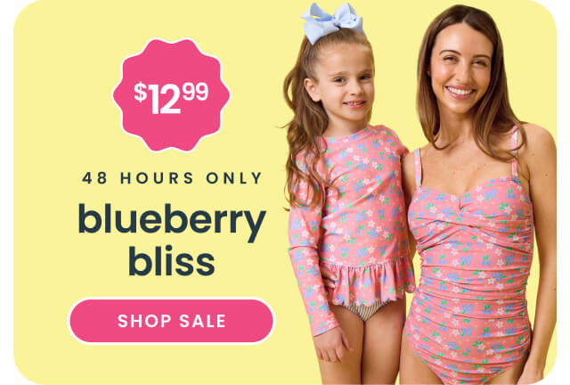 "Yellow banner reading ‘48 Hours Only’ and "Blueberry Bliss.’ Features blueberry swimsuits in pink and blue prints with text ‘All Styles $12.99’ and a pink ‘Shop Sale’ button."