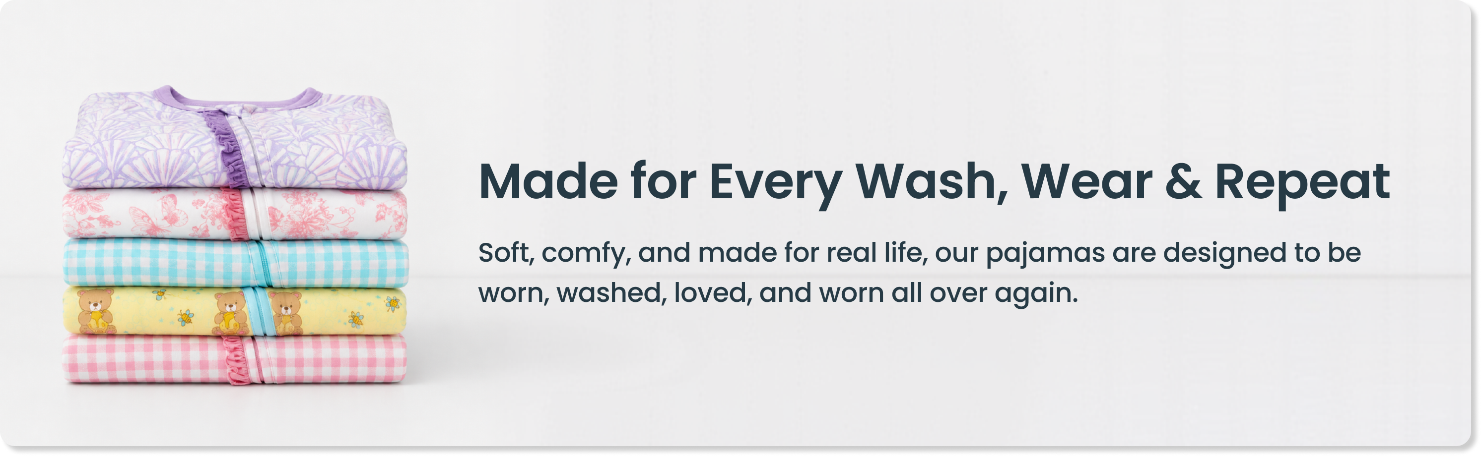 Promotional graphic showing a stack of folded printed pajamas. Text reads ‘Made for Every Wash, Wear & Repeat’ and highlights softness, comfort, and everyday durability.