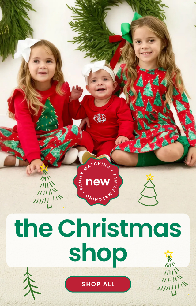 Promotional banner showing four people wearing matching pink Christmas pajamas. Text reads ‘The Christmas Shop,’ featuring new prints, fresh styles, and matching looks for the whole family, with a Shop All button.