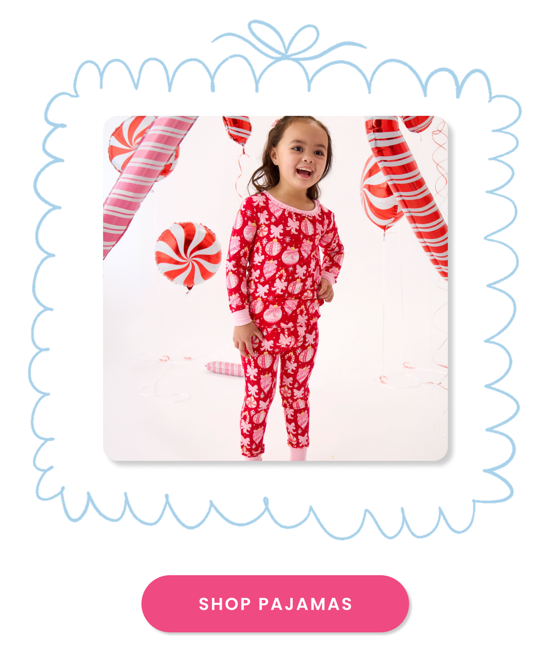 "Holiday pajama shop tile featuring red holiday pajamas with ornament and bow prints, surrounded by candy cane balloon decorations. Includes a pink ‘Shop Pajamas’ button."