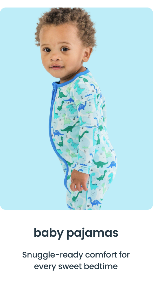 "Baby wearing a zip‑front pajama with blue dinosaur prints on a light blue background. Text reads &lsquo;baby pajamas&rsquo; and &lsquo;Snuggle‑ready comfort for every sweet bedtime.&rsquo;"