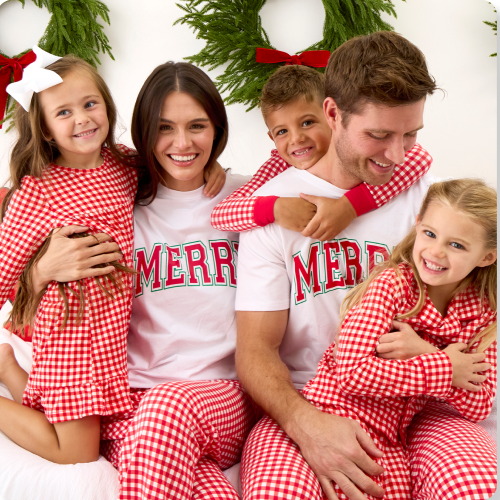 Promotional image showing four family members wearing matching red gingham holiday pajamas and coordinating tops. Featured as family matching sleepwear and loungewear.