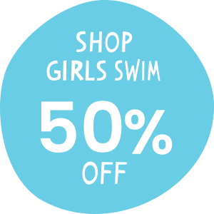 Blue circular graphic with white text that reads 'Shop Girls Swim 50% Off.' Links to girls&rsquo; swimwear collection