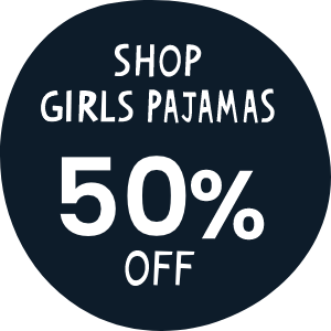 Dark blue circular graphic with white text that reads 'Shop Girls Pajamas 50% Off.' Links to girls&rsquo; pajama collection.