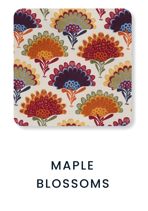 Shop By Print tile featuring a cream background with stylized floral motifs in red, orange, blue, gold, and green. Text reads ‘Maple Blossoms.
