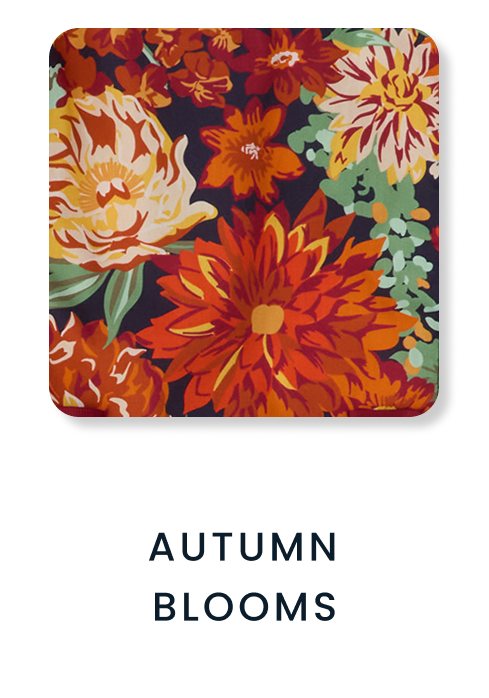 Shop By Print tile featuring a dark floral pattern with large orange, red, cream, and green blooms. Text reads ‘Autumn Blooms.